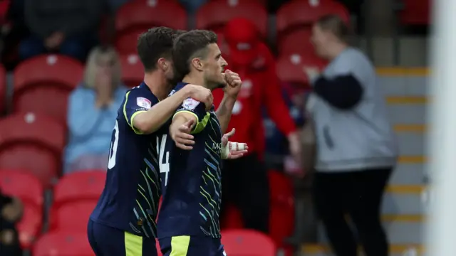 Josh March celebrates his goal for Crewe at Fleetwood
