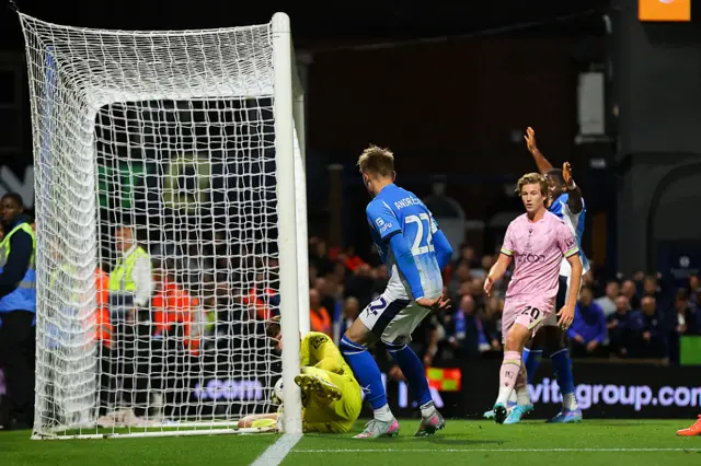 Bradford's Sam Walker saves from Brenony Andresson