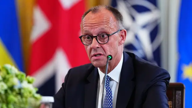 German Chancellor Friedrich Merz speaks in a Multilateral Meeting with European Leaders in the East Room of the White House in Washington