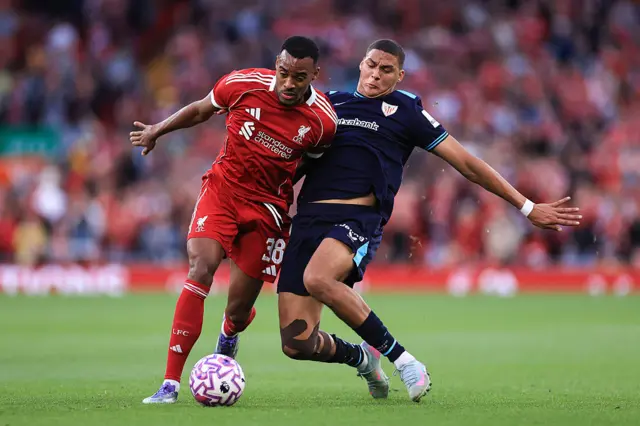Maroan Sannadi of Athletic Bilbao tackles Ryan Gravenberch