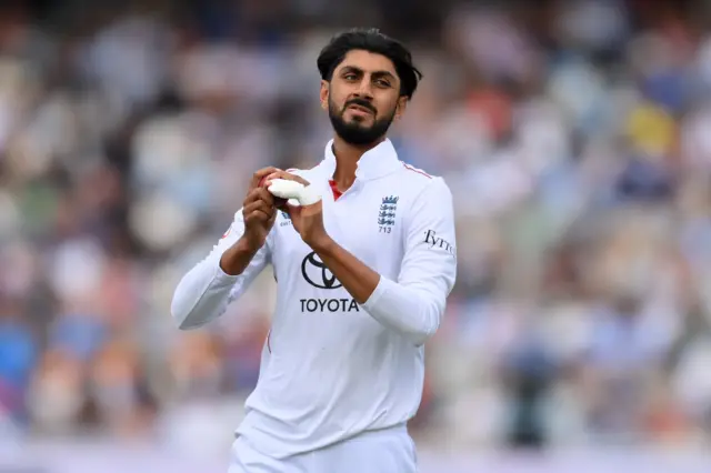 Shoaib Bashir celebrates
