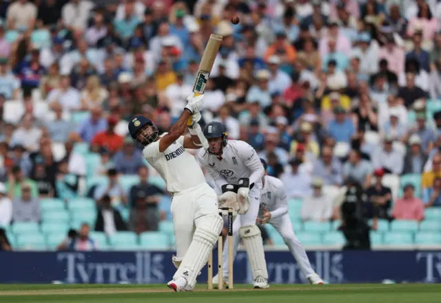 Akash Deep plays a shot
