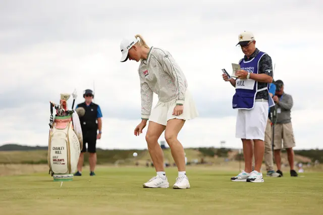 Charley Hull picks up her ball