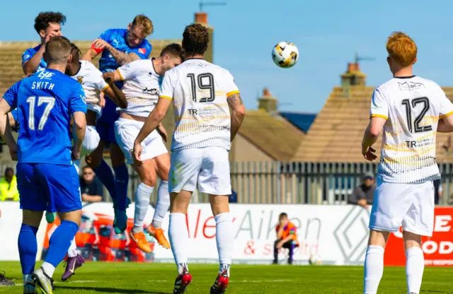 Peterhead's Jason Brown scores