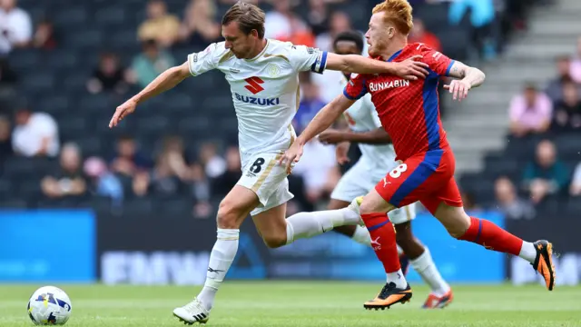 MK Dons v Oldham match action