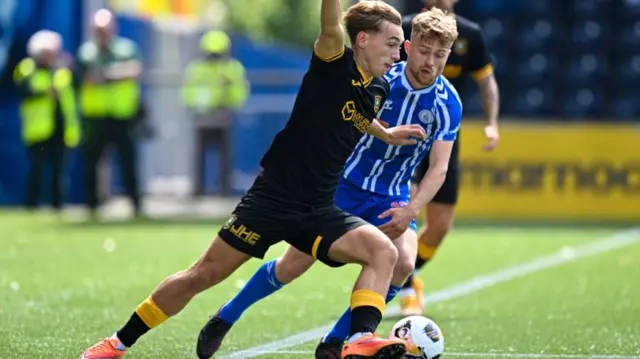 Livingston's Adam Montgomery and Kilmarnock's David Watson