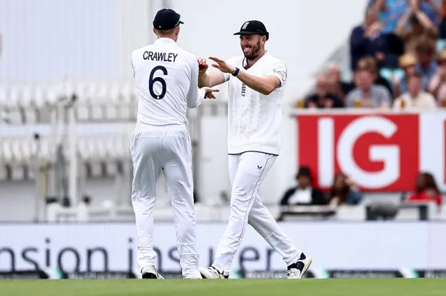 Jamie Overton celebrates after catching Jaiswal