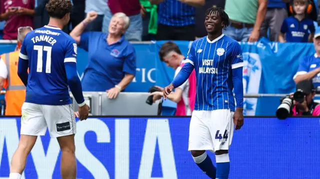 Ronan Kpakio celebrates scoring