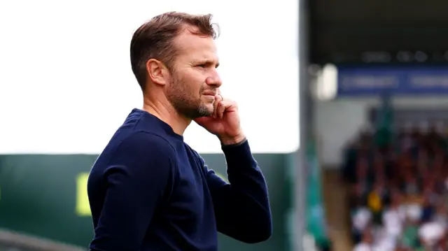 Tom Cleverley on the touchline