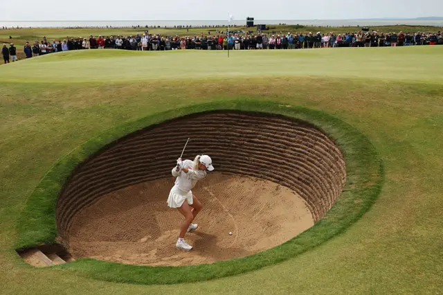 Charley Hull chips out the bunker