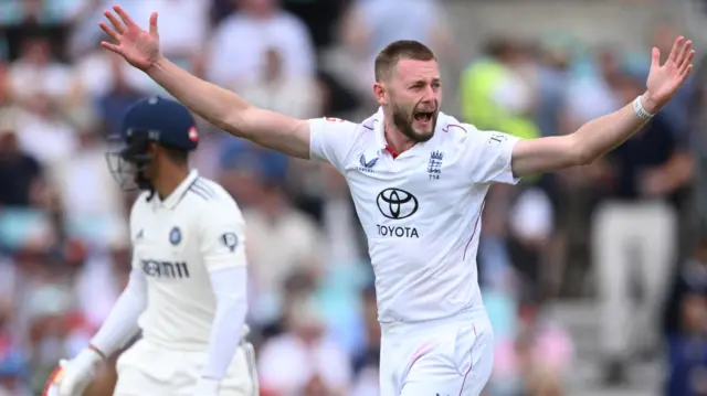 Gus Atkinson appeals for the wicket of Shubman Gill