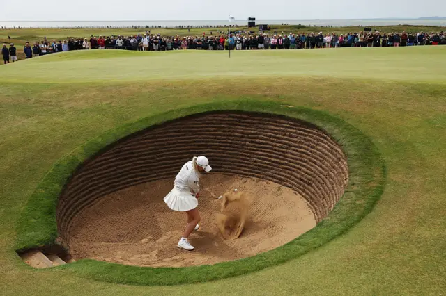 Charley Hull chips out the bunker