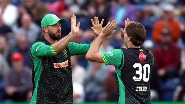 James Coles of Southern Brave celebrates with team mate James Vince after taking the wicket of Tom Kohler-Cadmore