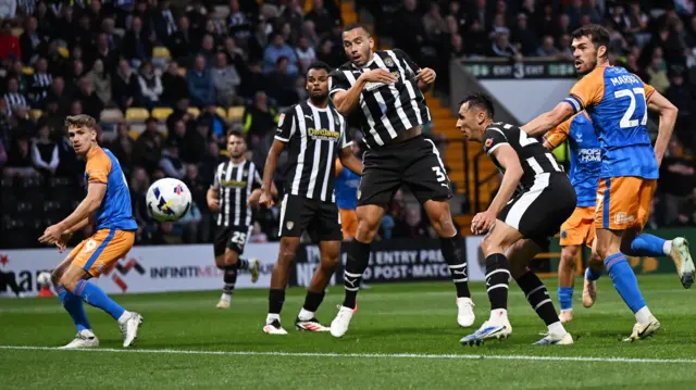 John Marquis scores for Shrewsbury against Notts County