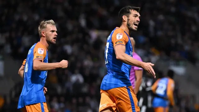 John Marquis celebrates for Shrewsbury