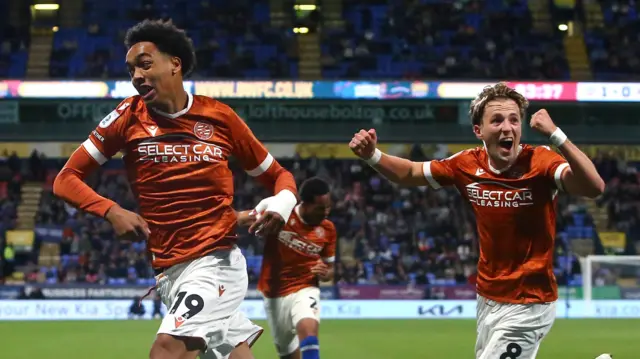 Andre Garcia celebrates his equaliser for Reading