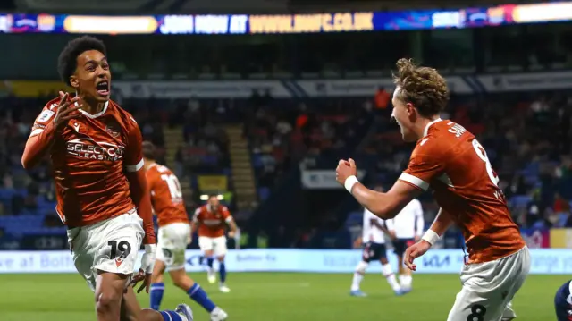 Andre Garcia celebrates his equaliser for Reading at Bolton
