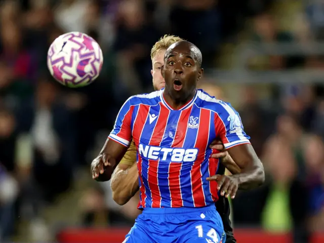 Mateta reacts as he prepares to control the ball