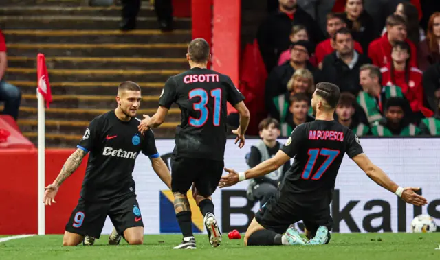 FCSB's Daniel Birligea celebrates as he scores to make it 1-0 during a UEFA Europa League Play-Offs First Leg match between Aberdeen and FCSB at Pittodrie Stadium