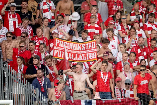 Fredrikstad fans cheer for their side v FC Midtjylland