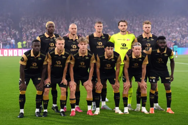 Fredrikstad players pose for their pre-match team photo