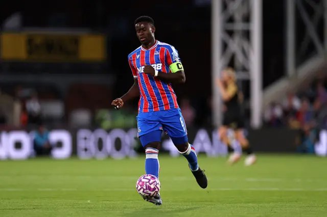 Guehi brings the ball out of defence