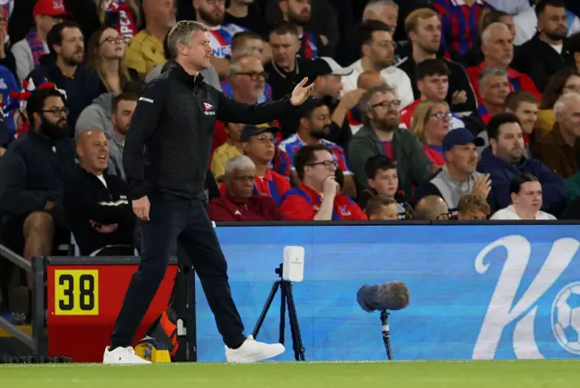 Fredrikstad manager coaches on the sideline