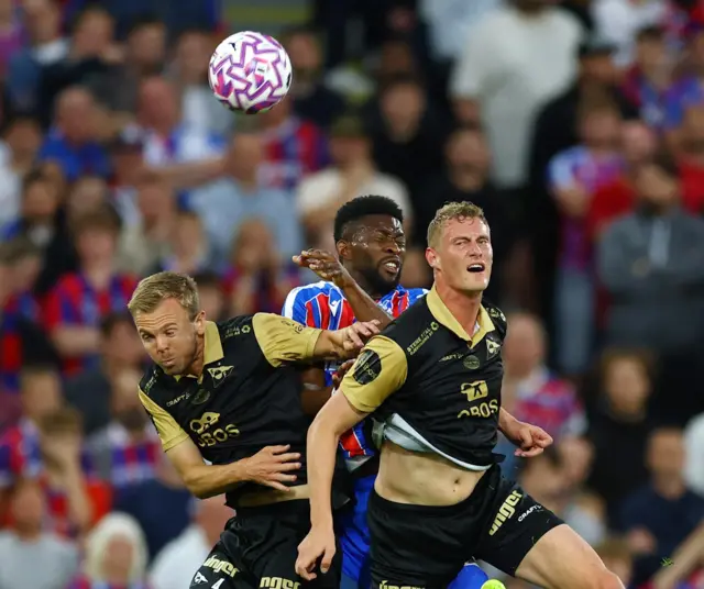 Lerma goes up to head the ball against two Fredrikstad players