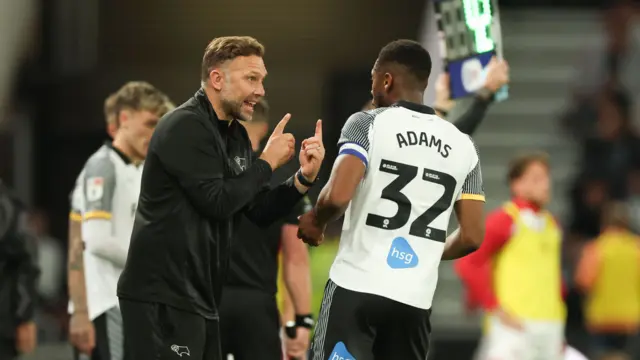 Derby boss John Eustace gives Ebou Adams instructions