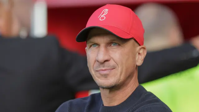 Gerhard Struber wearing a red Bristol City cap