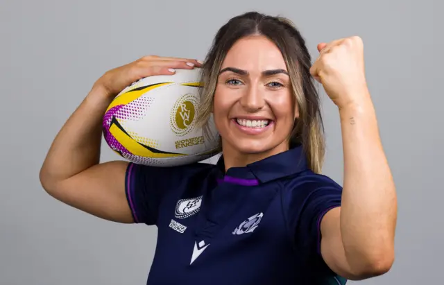 Scotland's Emma Wassell poses with a 2025 Rugby World Cup ball