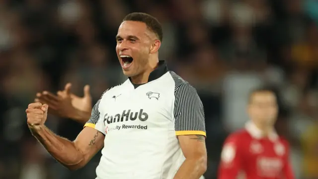 Carlton Morris celebrates his equaliser
