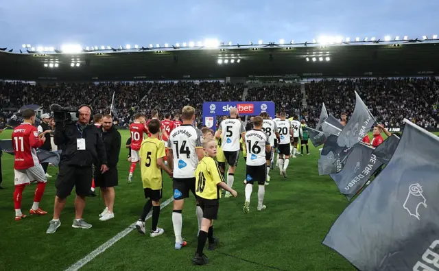 Derby and Bristol City walk on to the pitch