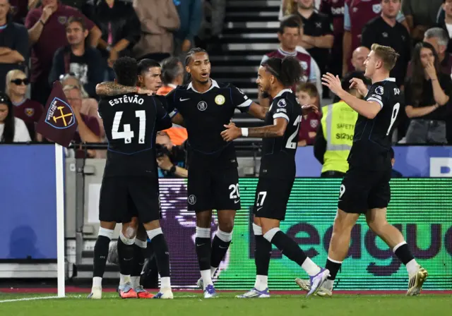 Chelsea's Enzo Fernandez celebrates scoring their third goal with Estevao, Joao Pedro, Malo Gusto and Liam Delap