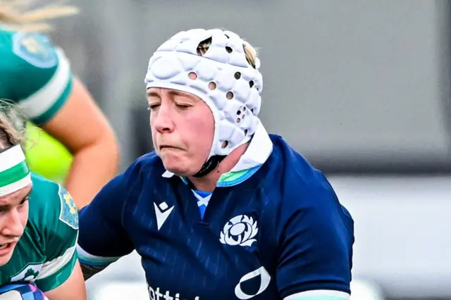 Lana Skeldon makes a tackle in Scotland's game against Ireland