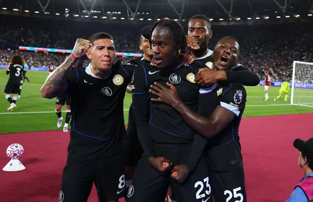 Trevoh Chalobah of Chelsea celebrates scoring the fifth goal with team mates during the Premier League match between West Ham United and Chelsea at London Stadium on August 22, 2025 in London, England.