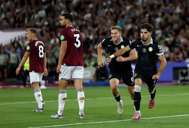 Pedro Neto of Chelsea celebrates scoring his team's second goal during the Premier League match between West Ham United and Chelsea at London Stadium on August 22, 2025 in London, England.