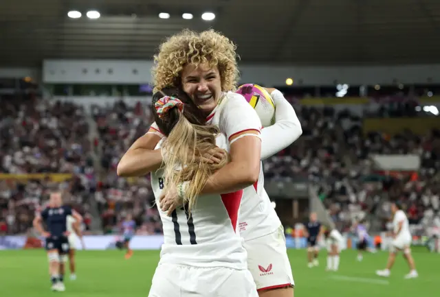 Ellie Kildunne celebrates with Jess Breach in England's win against the United States at the Rugby World Cup
