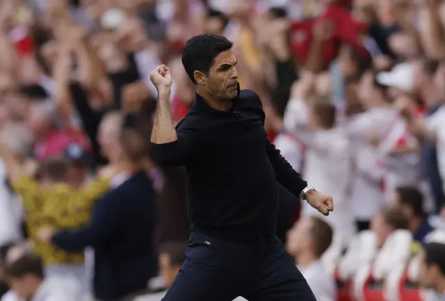 Arteta pumps his fist to celebrate the goal