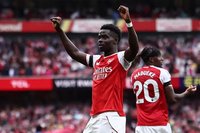 Saka celebrates scoring Arsenal's second goal