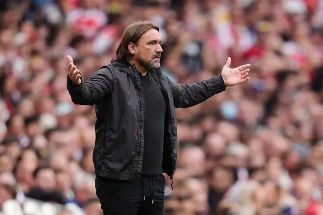 Farke waves his hands in disbelief on the touch line