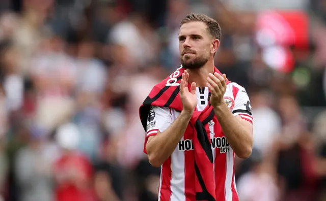 Jordan Henderson of Brentford applauds the fans