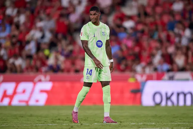 Marcus Rashford looking on in Barcelona kit