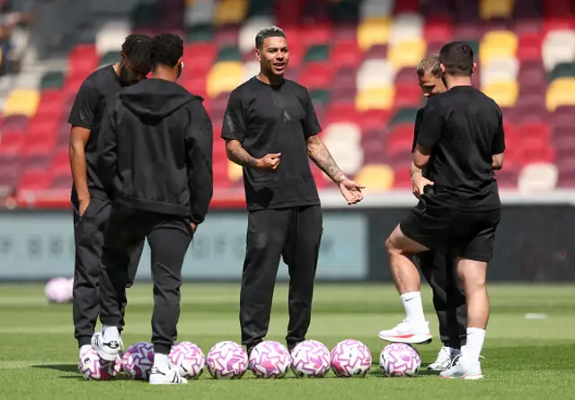 Morgan Rogers of Aston Villa interacts with teammates