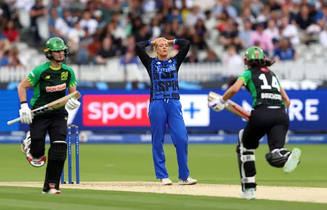 Sarah Glenn of London Spirit reacts as Laura Wolvaardt and Maia Bouchier of Southern Brave score runs during the The Hundred match between London Spirit Women and Southern Brave Women at Lord's Cricket Ground on August 23, 2025 in London, England.