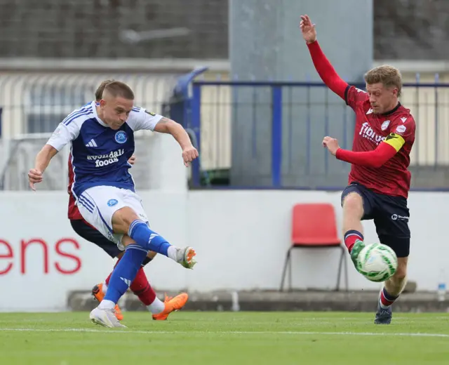 Lyndon Kane blocks a shot