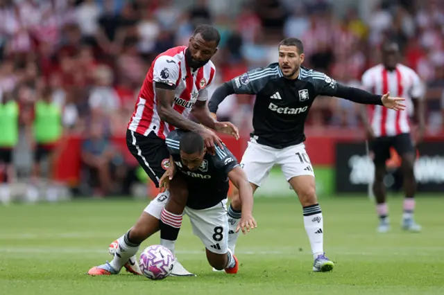 Youri Tielemans of Aston Villa is fouled by Igor Thiago