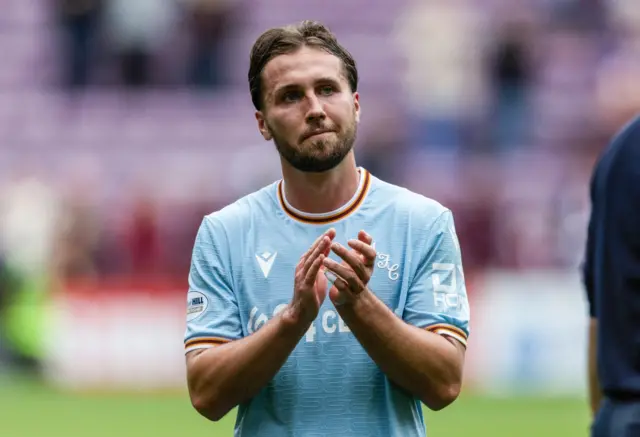 Motherwell's Lukas Fadinger applauds the travelling fans