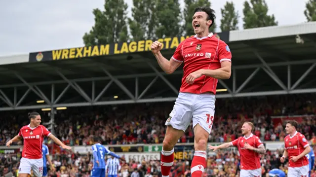 Kieffer Moore celebrates for Wrexham