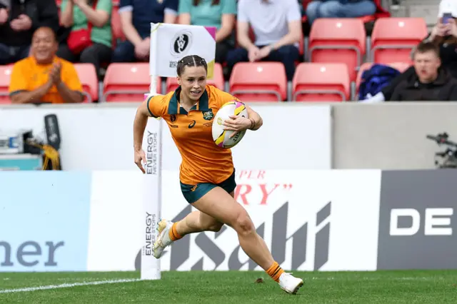 Miller scoring her hat-trick